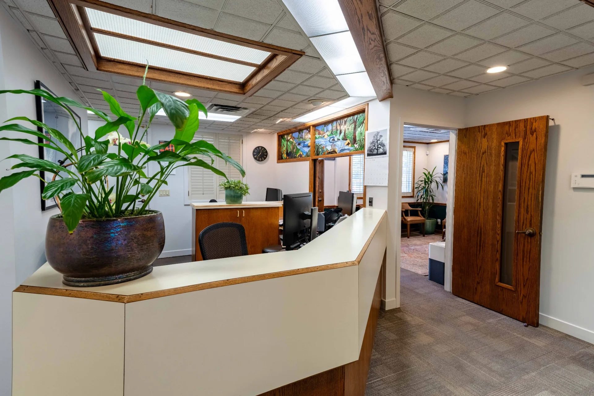 Front desk and hallway inside the dental office